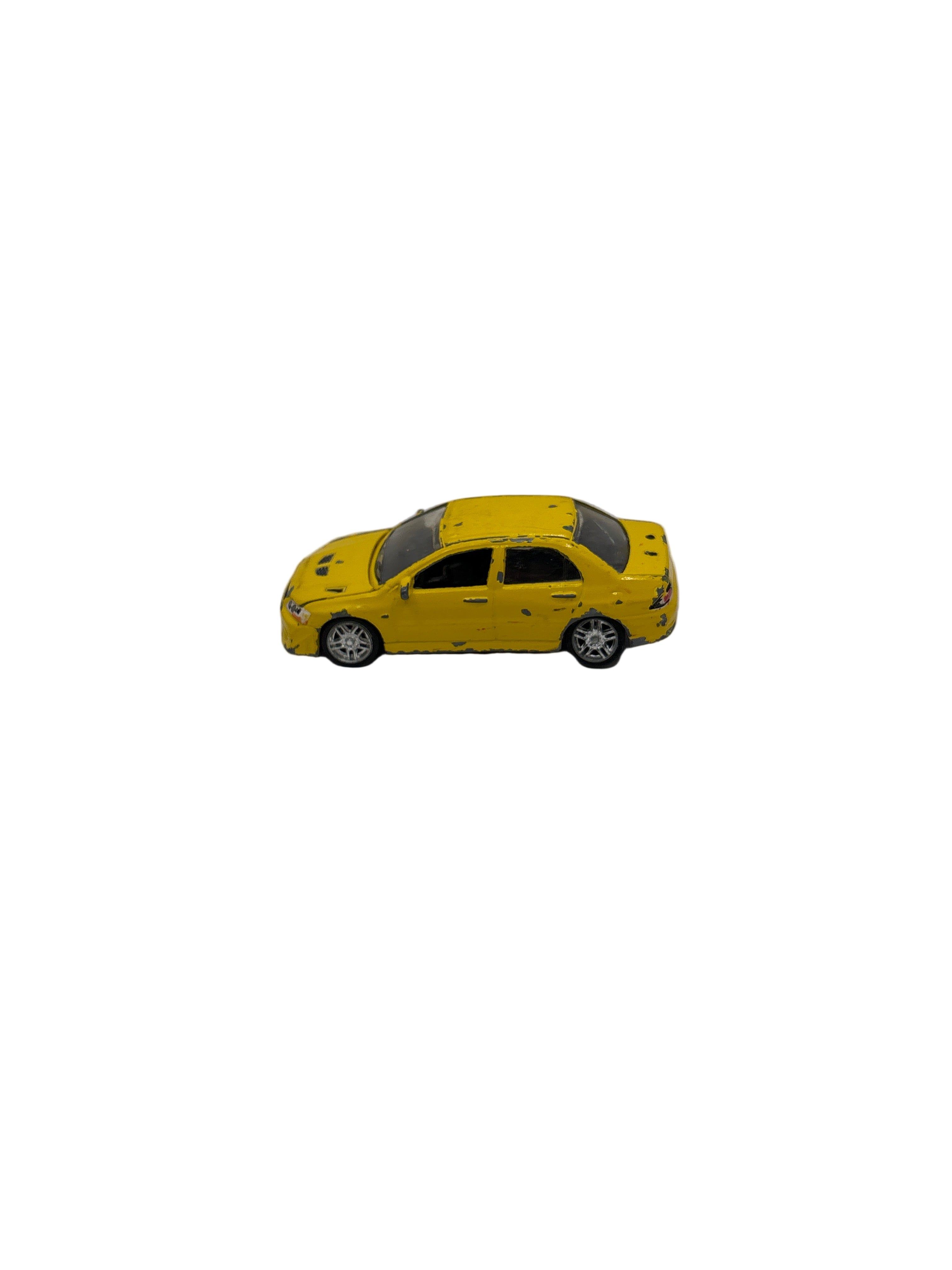 Racing Champions 2002 Mitsubishi Lancer Evolution VII Diecast yellow