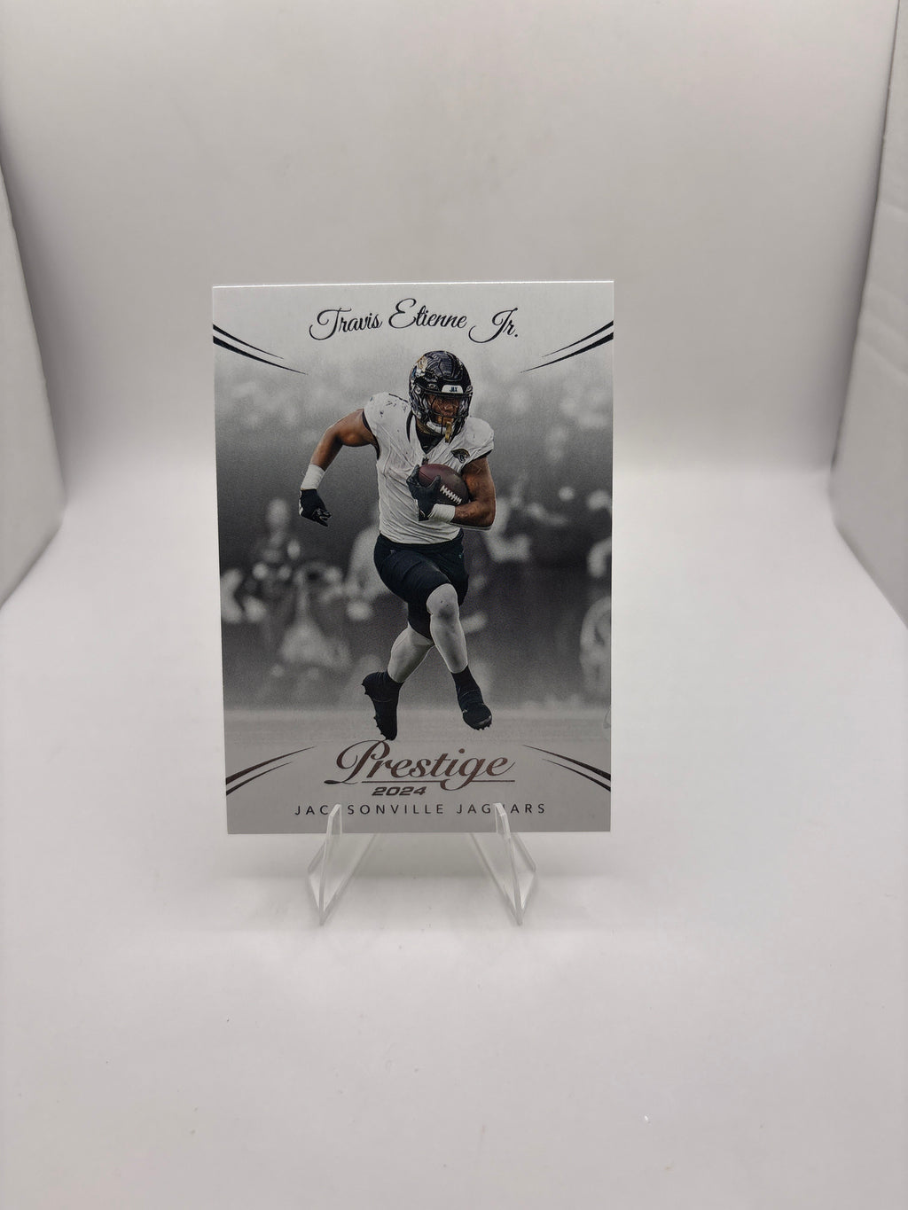 Prestige Travis Etienne JR.