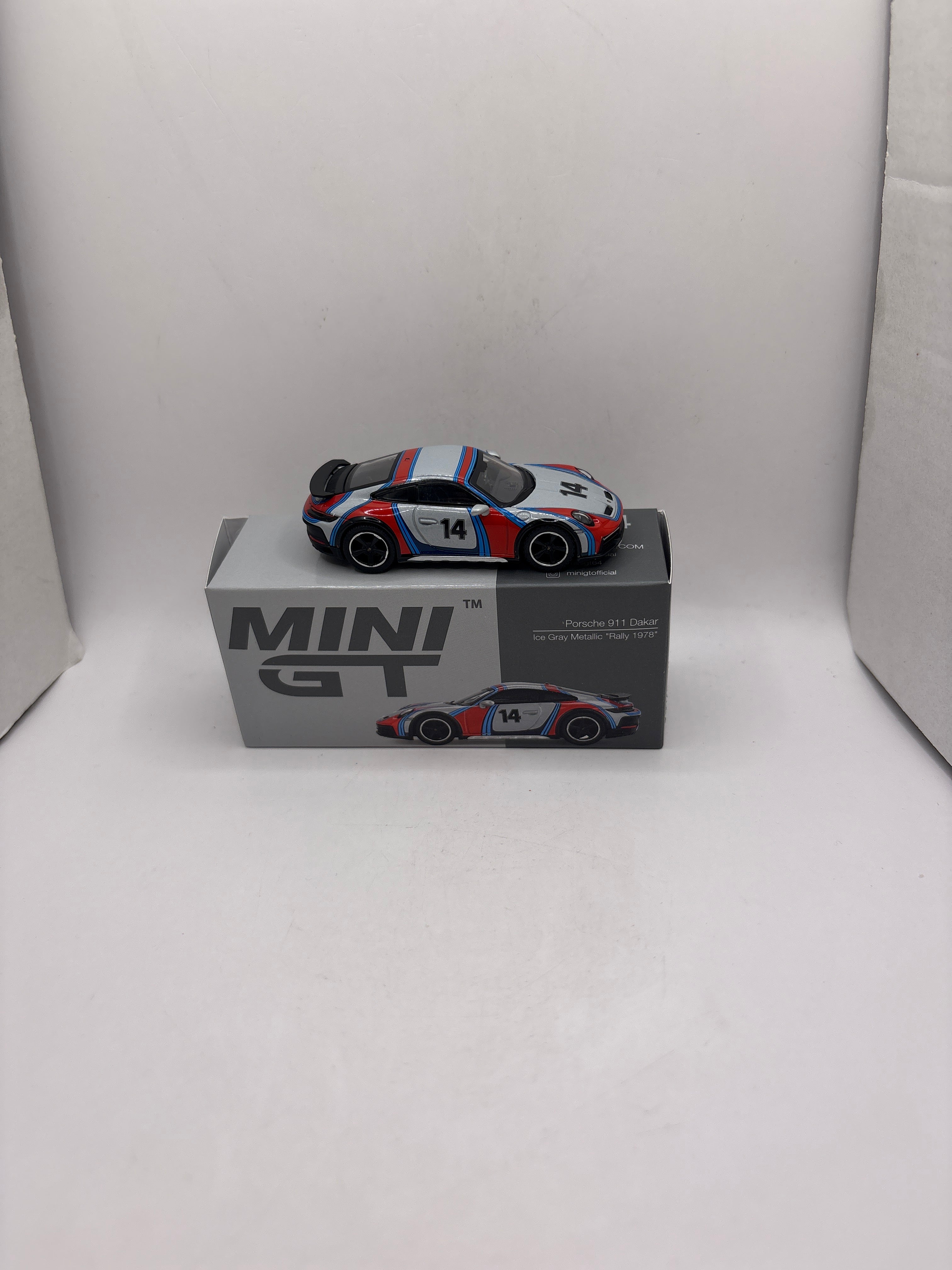 Mini GT Porsche 911 Dakar Diecast multi color